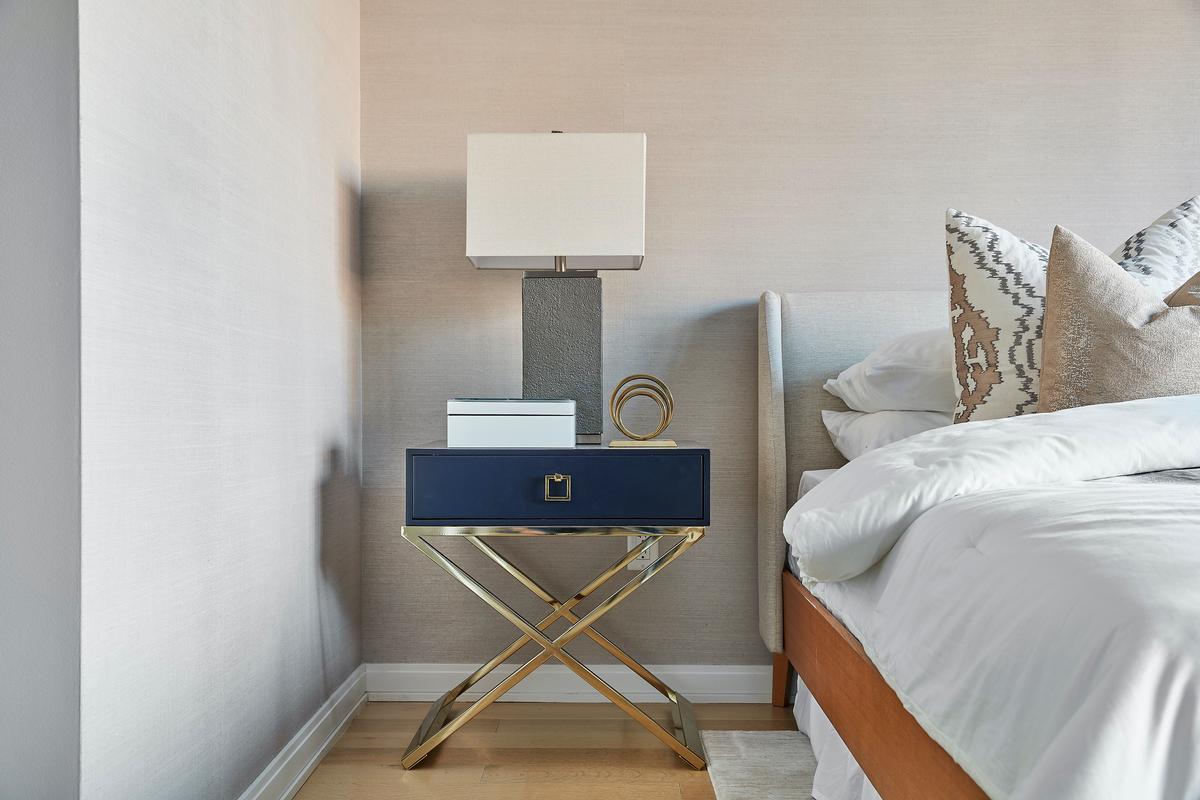 Wallpaper adds elegance and texture to a neutral toned master bedroom. (Scott Gabriel Morris/TNS)