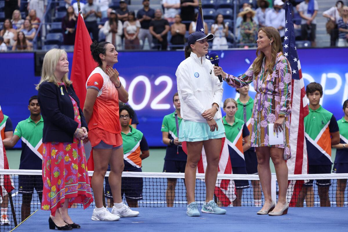Iga Swiatek (2nd R) of Poland is interviewed by Mary Jo Fernandez after defeating Ons Jabeur of Tunisia during their women’s singles final match of the U.S. Open tennis championships in New York on Sept. 10, 2022. (Matthew Stockman/Getty Images)