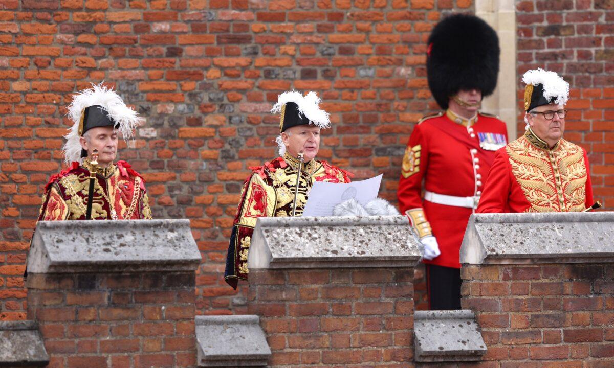 David Vines White, Garter King of Arms, reads the Principal Proclamation from the balcony overlooking Friary Court after the accession council as King Charles III is proclaimed king, at St James’s Palace in London on Sept. 10, 2022. (Richard Heathcote/WPA Pool/Getty Images)