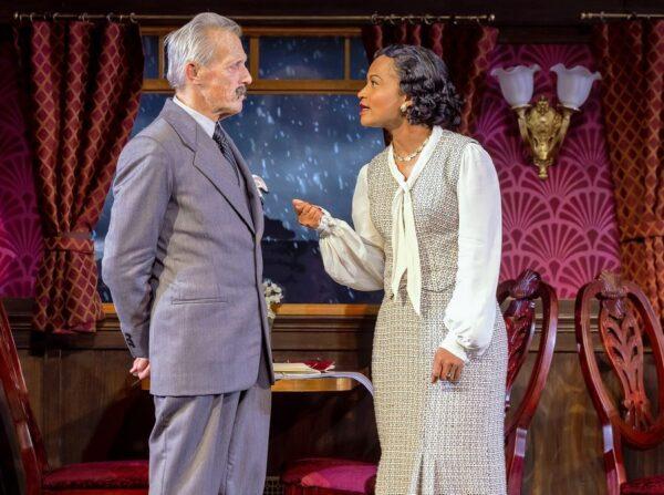 Hercule Poirot (Larry Yando) discusses the crime with Countess Andreny (Diana Coates), in “Murder on the Orient Express.” (Brett Beiner)
