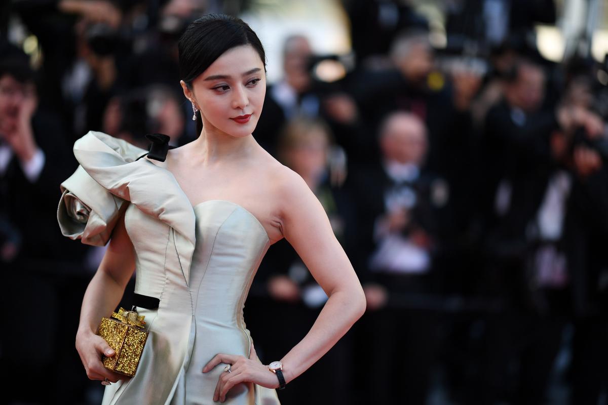 Actress Fan Bingbing poses as she arrives on May 11, 2018, for the screening of "Ash is Purest White (Jiang hu er nv)" at the 71st edition of the Cannes Film Festival in Cannes, France. (Loic Venance/AFP via Getty Images)