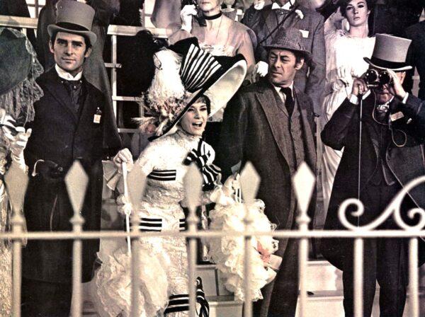 (L–R) Jeremy Brett as Freddy, Audrey Hepburn as Eliza Doolittle, and Rex Harrison as Professor Higgins at the Ascot races, in "My Fair Lady." (MovieStillsDB)