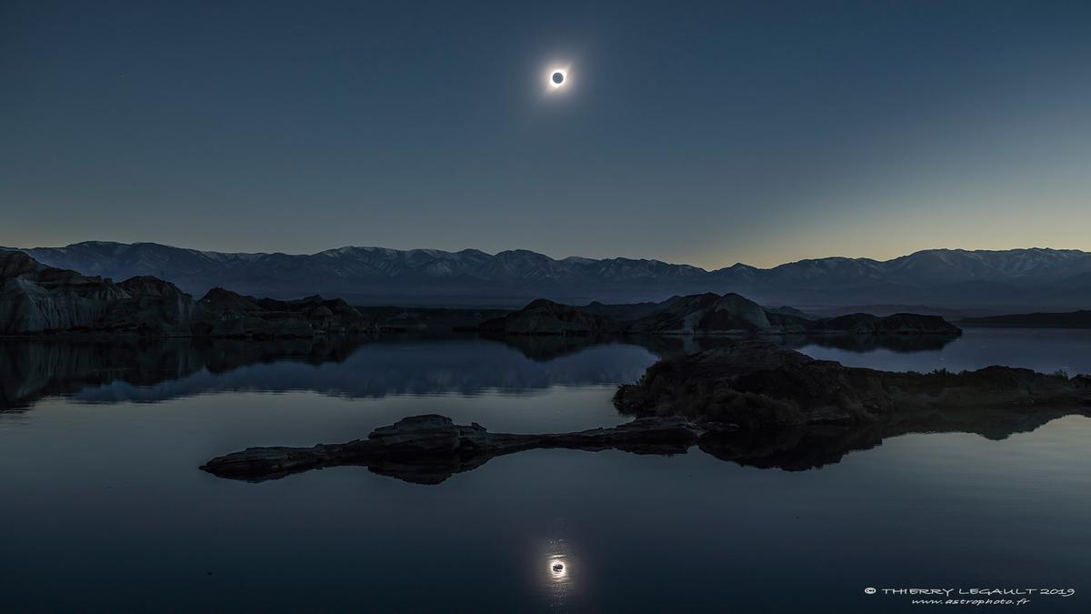 Total eclipse of the sun from the shore of the lake La Cuesta Del Viento with the Andes in the background, near Rodeo, Argentina. (Courtesy of <a href="http://www.astrophoto.fr/">Thierry Legault</a>)