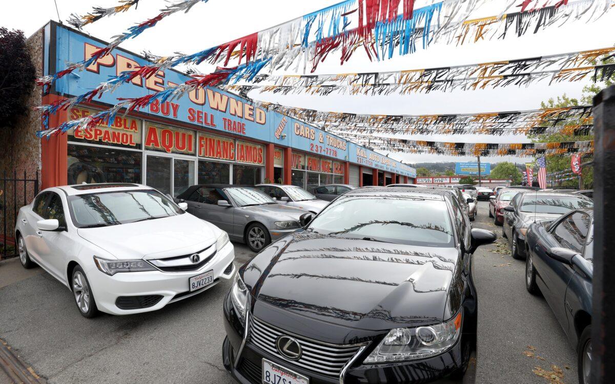 Used cars for sale are displayed on the sales lot at K&L Auto Expert in Richmond, Calif., on May 6, 2022. (Justin Sullivan/Getty Images)