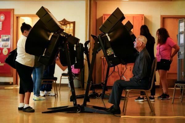 Voters cast their ballots in the Kansas Primary Election at Merriam Christian Church in Merriam, Kansas on Aug. 2, 2022. Voters in Kansas were deciding on whether or not to remove protection for abortion from the state's constitution. (Kyle Rivas/Getty Images)