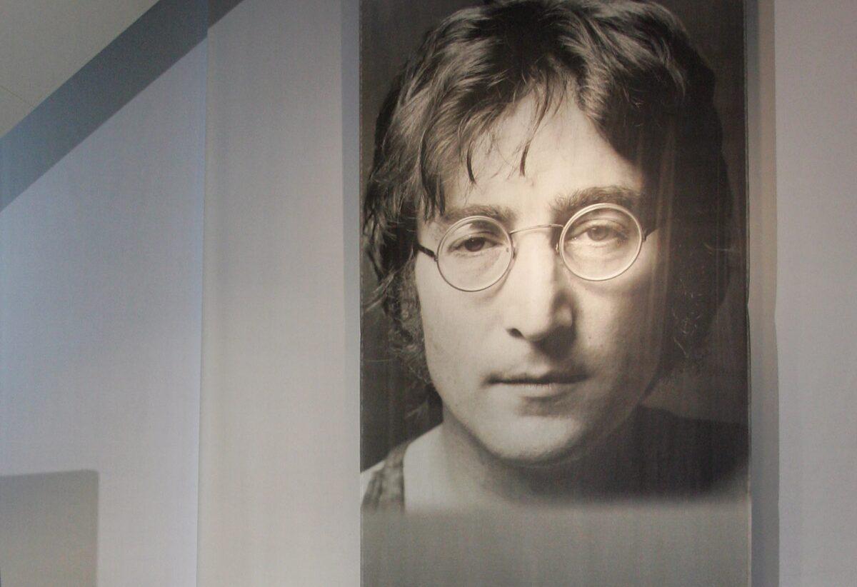 A large portrait of John Lennon at the John Lennon Museum in Saitama city, suburban Tokyo, on Dec. 8, 2006, to commemorate former Beatles's murder on this day in New York in 1980. (Yoshikazu Tsuno/AFP via Getty Images)