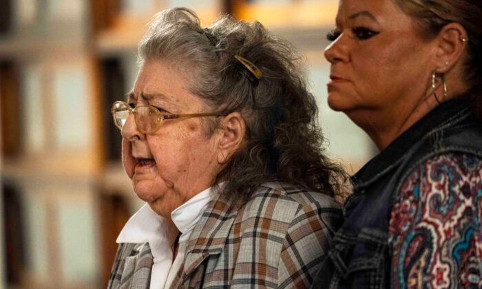 Geneva Rhoden, the matriarch of the Rhoden family, is helped into court during the trial of George Wagner IV, before opening statements on Sept. 12, 2022. (Liz Dufour/The Enquirer/Pool)