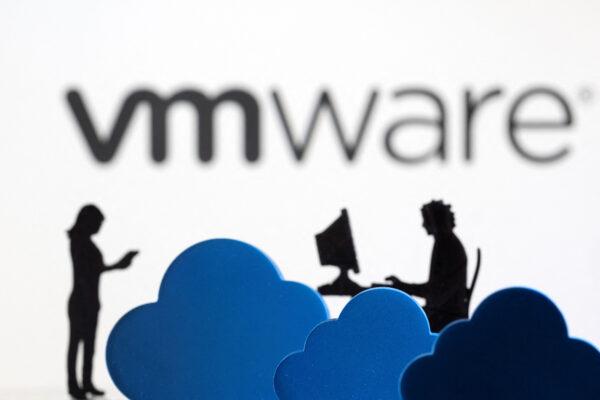 3D printed clouds and figurines in front of the VMware cloud service logo in a photo illustration taken on Feb. 8, 2022. (Dado Ruvic/Illustration/Reuters)