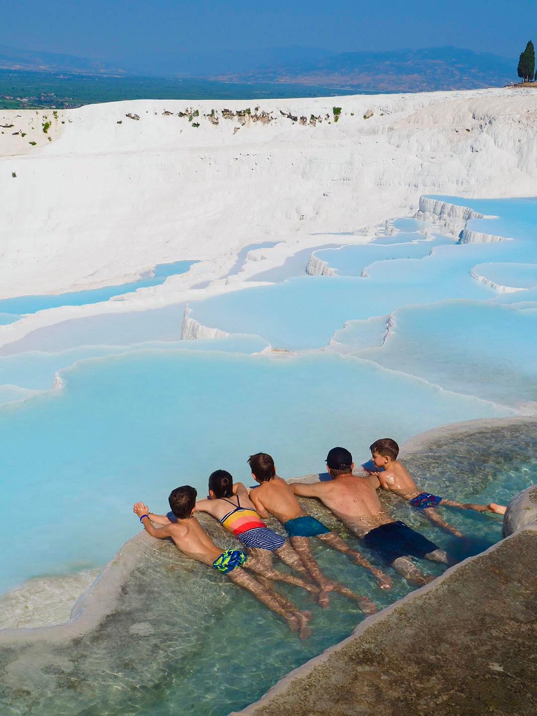 Sebastien and his kids enjoy the view at Pamukkale, Turkey. (Courtesy of Edith Lemay)