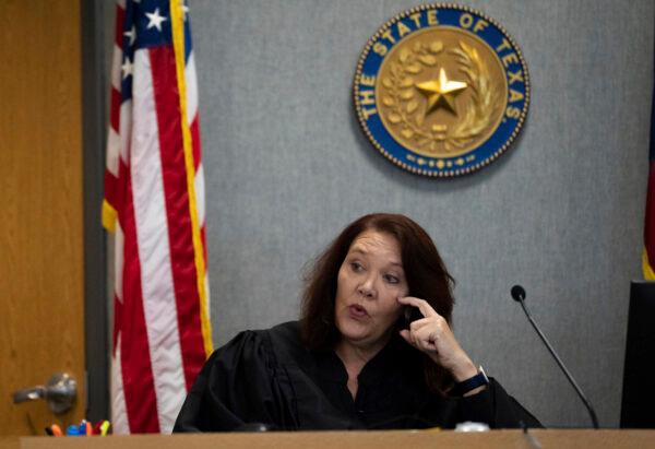 299th District Court Judge Karen Sage asks defendant Stephen Broderick for his plea as to the murder charges before him, in Austin, Texas, on Sept. 13, 2022. (Sara Diggins/Austin American-Statesman via AP)