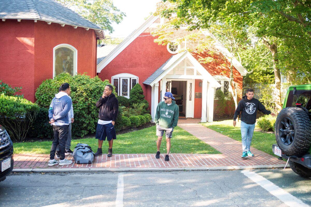 Nantucket Residents Rattled by Arrest of 5 Illegal Immigrants for Violent Sex Crimes | USNN World News Illegal immigrants gather, after being flown in from Texas on a flight funded by Florida Gov. Ron DeSantis, at Edgartown on Martha's Vineyard, Mass., on Sept. 15, 2022. (Vineyard Gazette/Handout via Reuters)