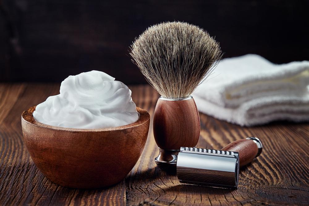 A traditional shaving bowl and brush are certainly practical grooming equipment, but they can also provide a bit of whimsical decor to the bathroom. (baibaz/Shutterstock)