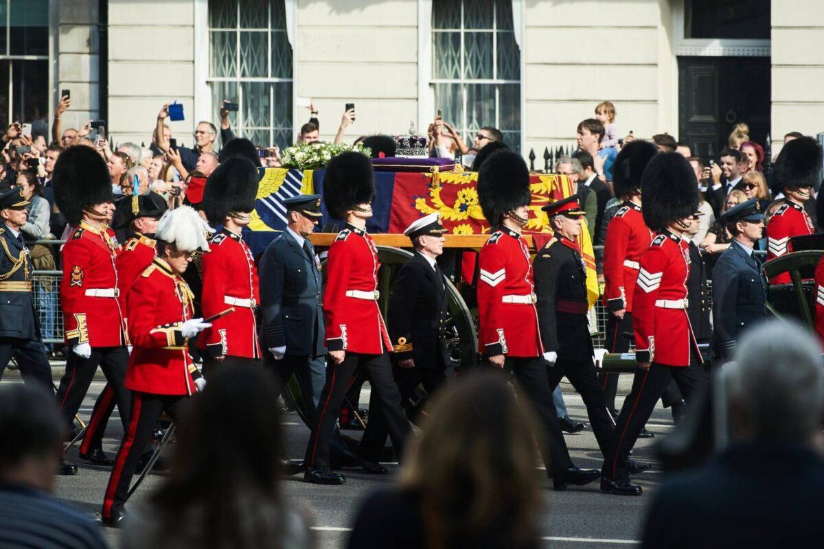 The coffin of Her Majesty Queen Elizabeth II being borne on a gun carriage in a procession from Buckingham Palace to Westminster Hall where it will lie-in-state, on Sep. 14, 2022. (Howard Cheng)