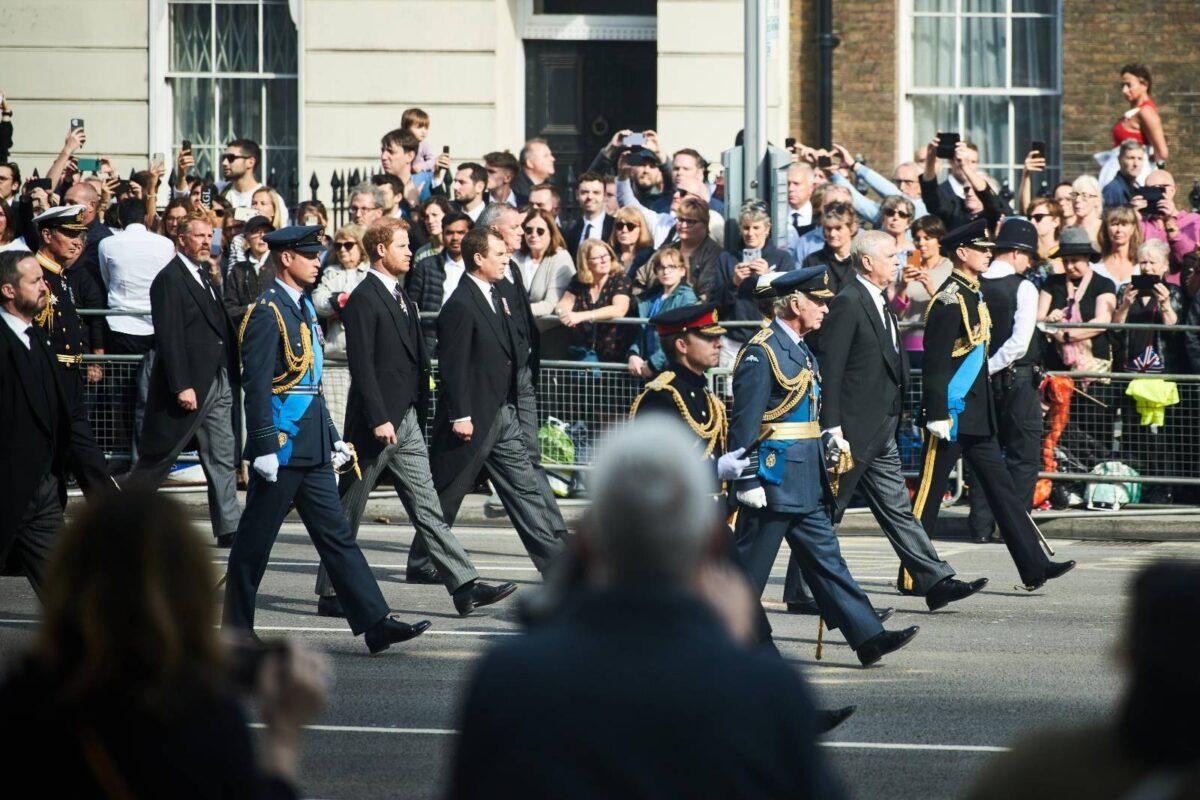 King Charles III leading members of the Royal Family, including Prince William Prince of Wales and Prince Harry Duke of Sussex, in a procession behind the coffin of Her Majesty Queen Elizabeth II, on Sep. 14, 2022. (Howard Cheng)