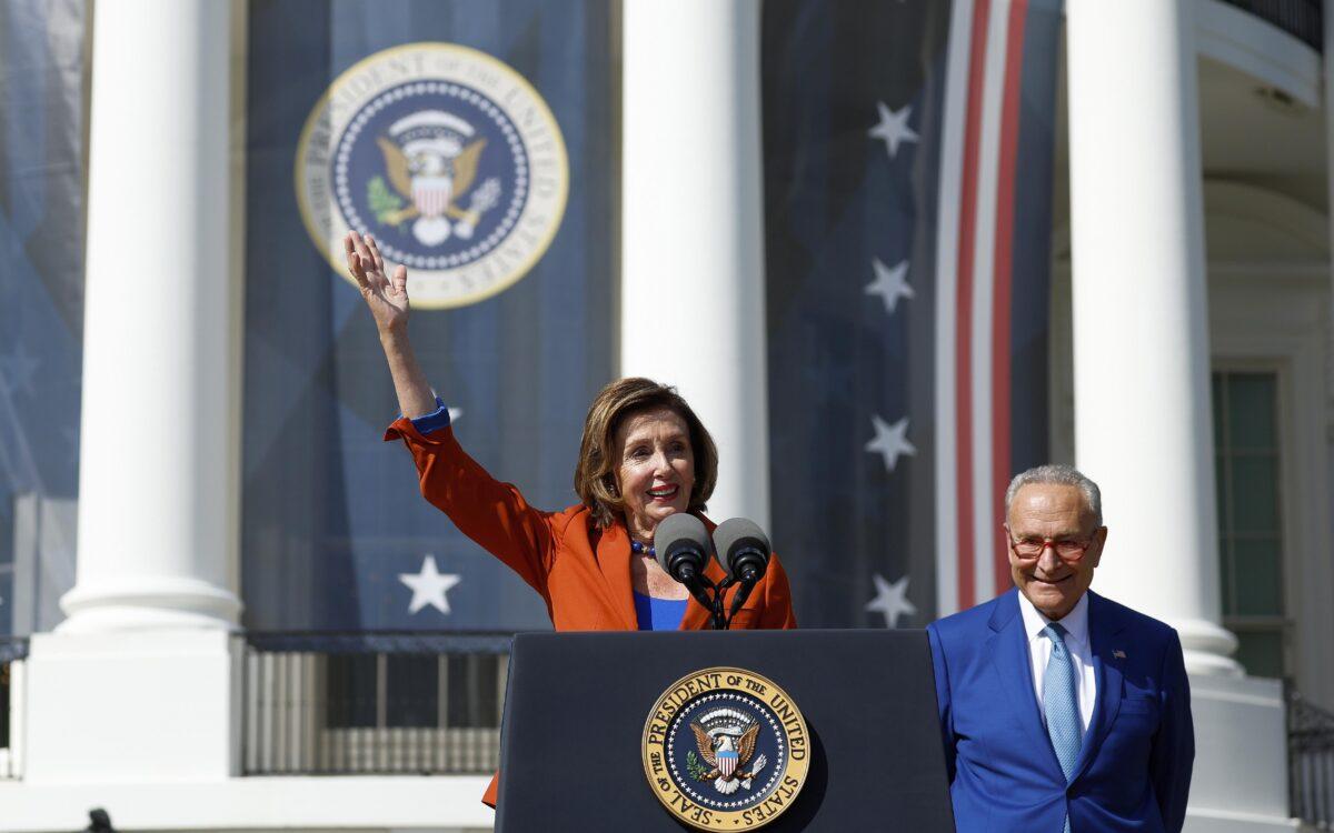 House Speaker Nancy Pelosi (D-Calif.) delivers remarks alongside Senate Majority Leader Chuck Schumer (D-N.Y.) at an event celebrating the passage of the Inflation Reduction Act on the South Lawn of the White House in Washington on Sept. 13, 2022. (Anna Moneymaker/Getty Images)