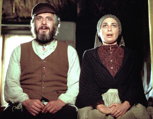 Chaim Topol as Tevye and Norma Crane as Golde, his wife, raise three daughter in changing times of Tsarist Russia in "Fiddler on the Roof." (MovieStillsDB)