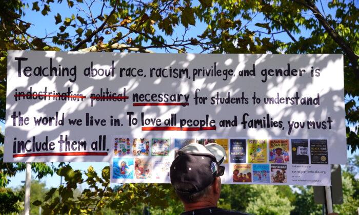 A protest sign at a rally outside the Loudoun County Public Schools (LCPS) administration building in Ashburn, Va., on Sept. 13, 2022. (Terri Wu/The Epoch Times)