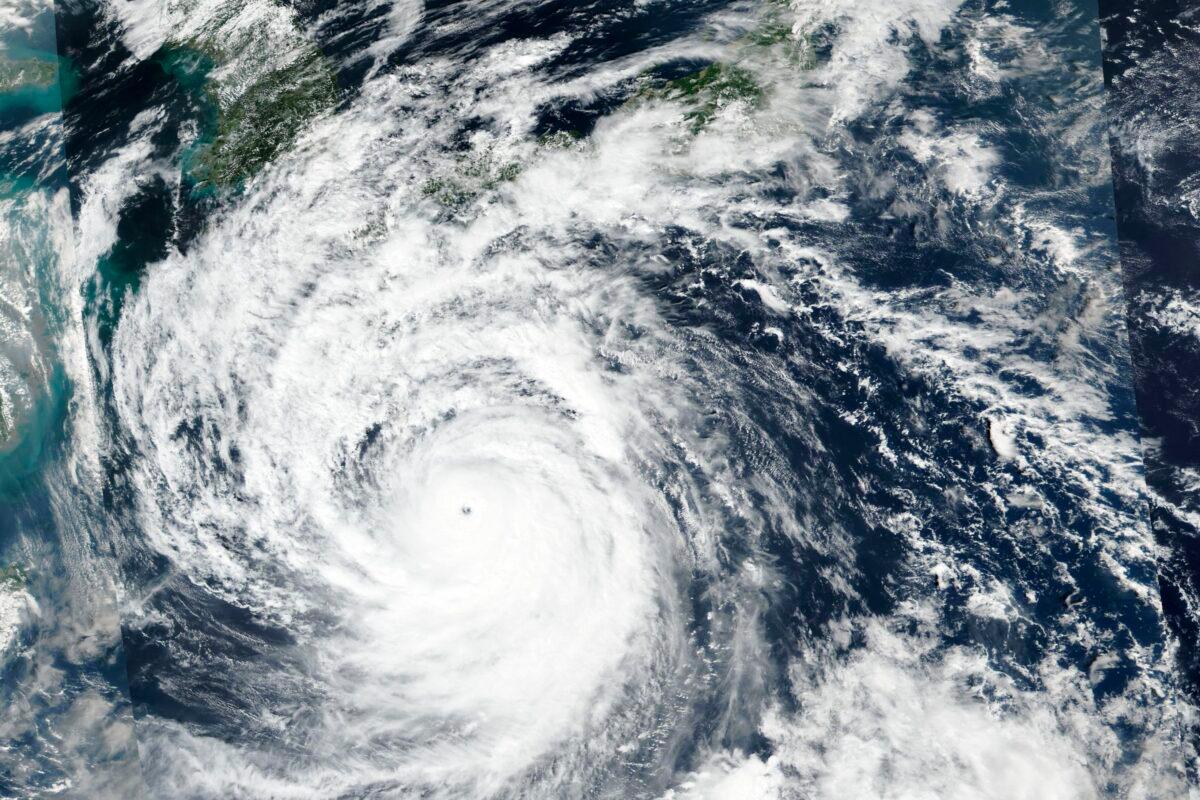 A satellite image shows Typhoon Nanmadol, which is approaching southwest Japan, on Sept. 17, 2022. (NASA Worldview, Earth Observing System Data and Information System (EOSDIS) via AP)