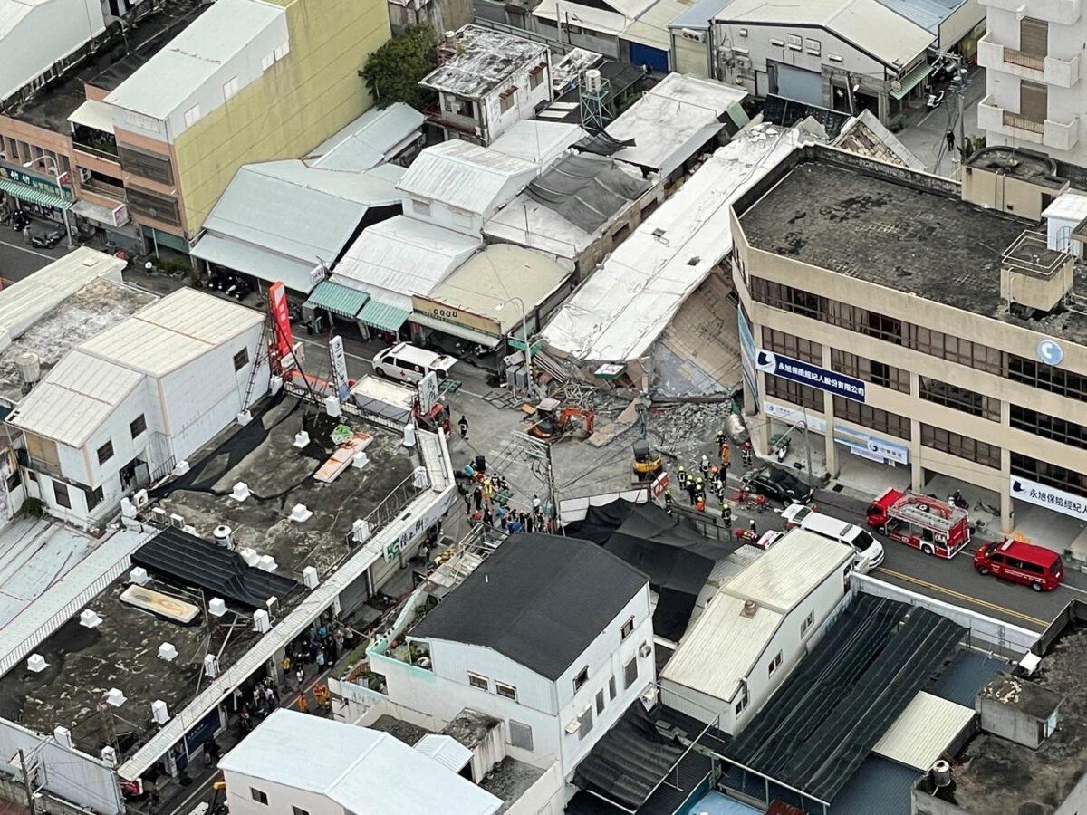 Firefighters work at the site of a building collapse following a 6.8-magnitude earthquake, in Yuli, Taiwan, on Sept. 18, 2022. (Taiwan's 0918 Earthquake Central Emergency Operations Center/Handout via Reuters)