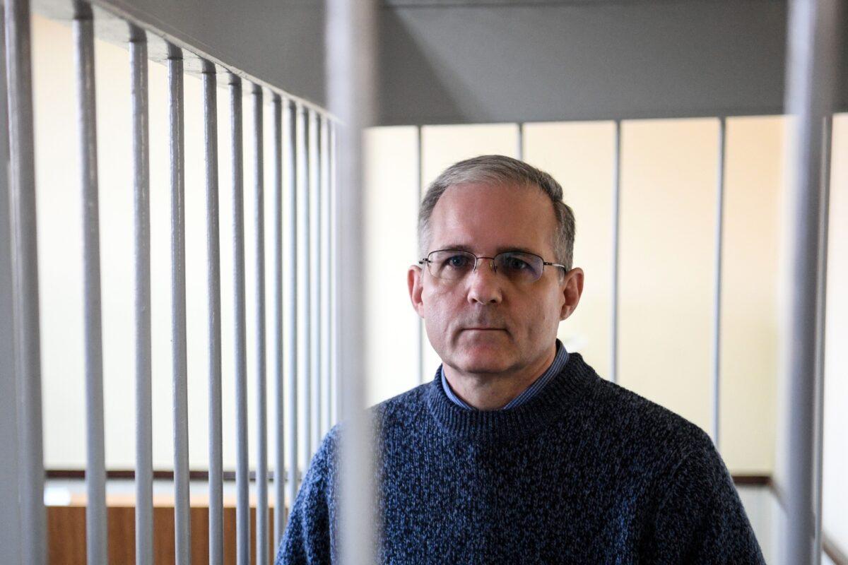 Paul Whelan, a former U.S. Marine arrested in Russia and accused of spying, stands inside a defendants' cage during a hearing at a court in Moscow on Aug. 23, 2019. (Kirill Kudryavtsev/AFP via Getty Images)