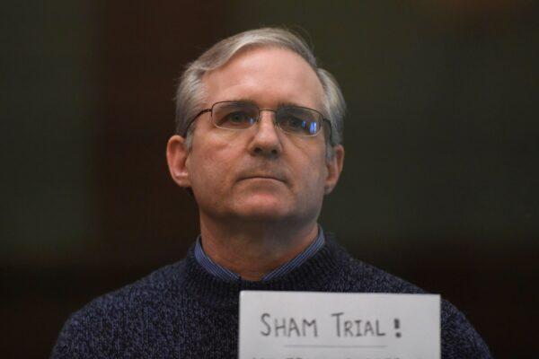 Paul Whelan, a former U.S. Marine accused of espionage and arrested in Russia in December 2018, stands inside a defendants' cage as he waits to hear his verdict in Moscow on June 15, 2020. (Kirill Kudryavtsev/AFP via Getty Images)