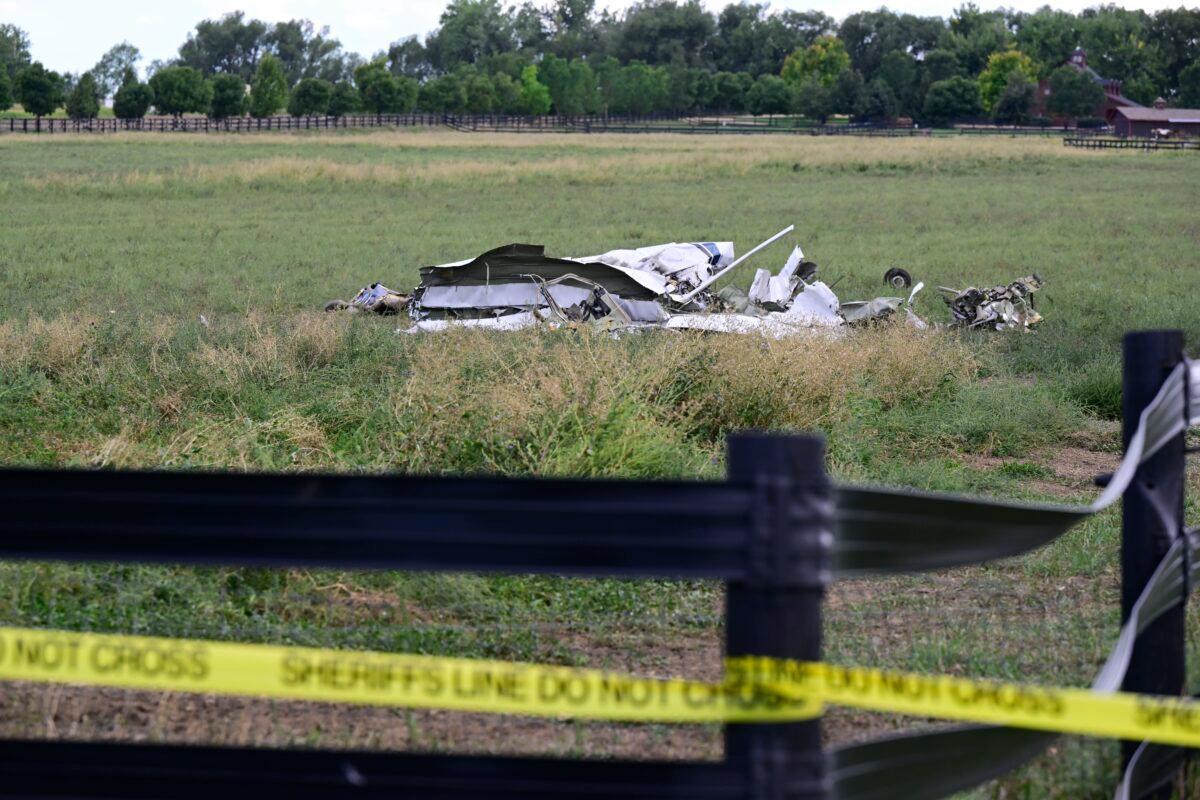 A crashed plane, one of two, lies along Niwot Road between Highway 287 and N. 95th St. in Longmont, Colo., on Sept. 17, 2022. (Andy Cross/The Denver Post via AP)