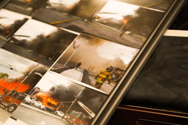 David Moore Sr. remembers a fire that was so big that it spread onto a fire truck. That fire was captured by pictures, which to this day remain his favorite. (Cara Ding/The Epoch Times)