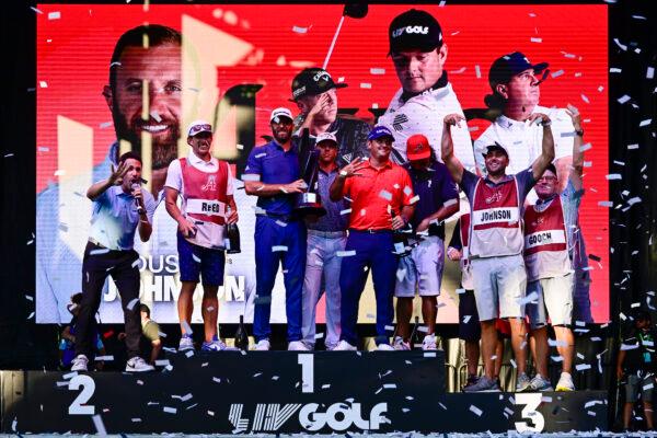 Team Captain Dustin Johnson of 4 Aces GC celebrates with teammates Pat Perez, Talor Gooch and Patrick Reed after winning the team title during the Final Round of the the LIV Golf Invitational—Chicago at Rich Harvest Farms in Sugar Grove, Ill., on Sept. 18, 2022. (Quinn Harris/Getty Images)