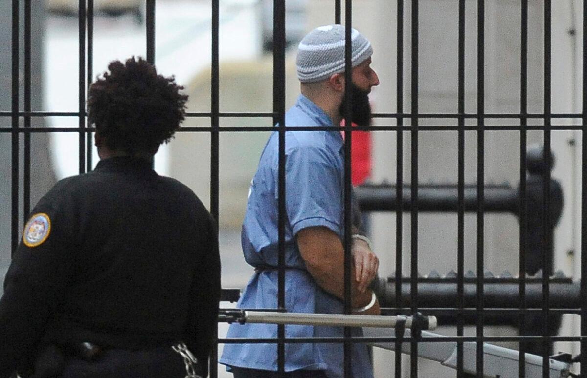 Adnan Syed enters Courthouse East prior to a hearing in Baltimore on Feb. 3, 2016. (Barbara Haddock Taylor/The Baltimore Sun via AP)