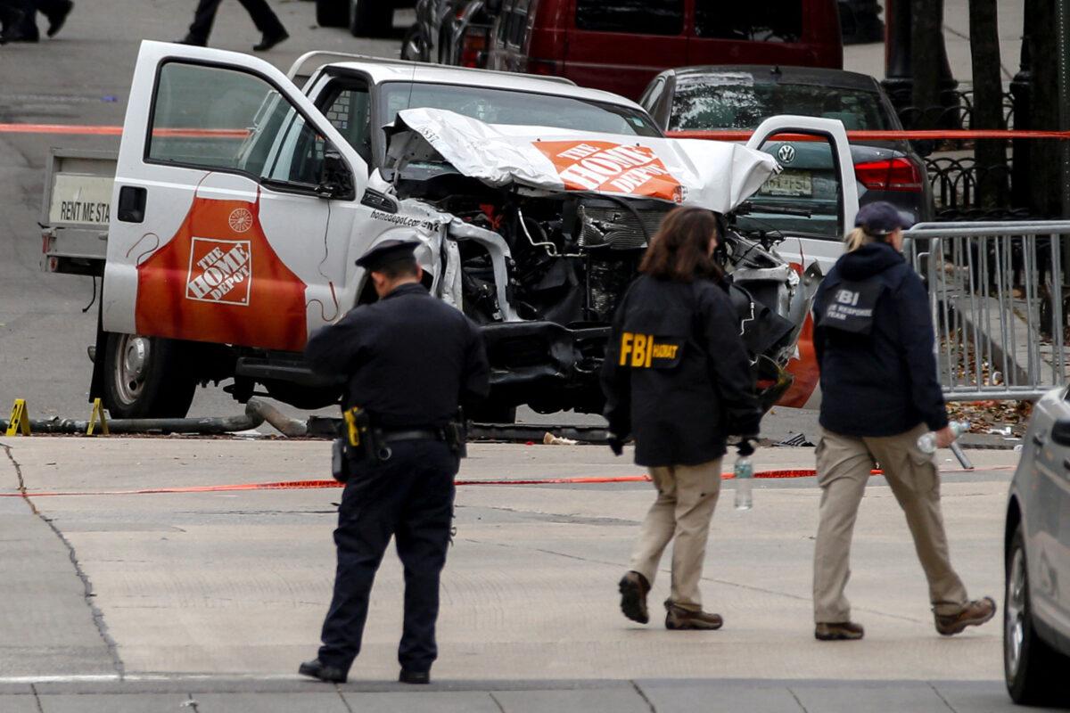 FBI agents and New York City Police Department (NYPD) investigate a pickup truck used in an attack on the West Side Highway in lower Manhattan in New York on Nov. 1, 2017. (Brendan McDermid/Reuters)
