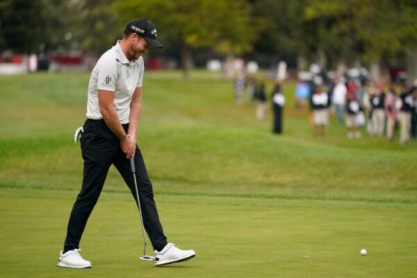 Danny Willett, of England, reacts after missing a par putt on the 18th green of the Silverado Resort North Course during the final round of the Fortinet Championship PGA golf tournament in Napa, Calif., on Sept. 18, 2022. (Eric Risberg/AP Photo)