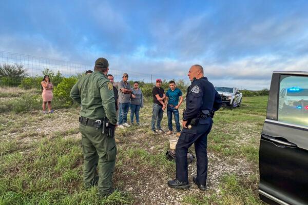 Border Patrol takes into custody six illegal immigrants who were being smuggled from the U.S.–Mexico border, through Kinney County, Texas, on Aug. 28, 2022. (Charlotte Cuthbertson/The Epoch Times)