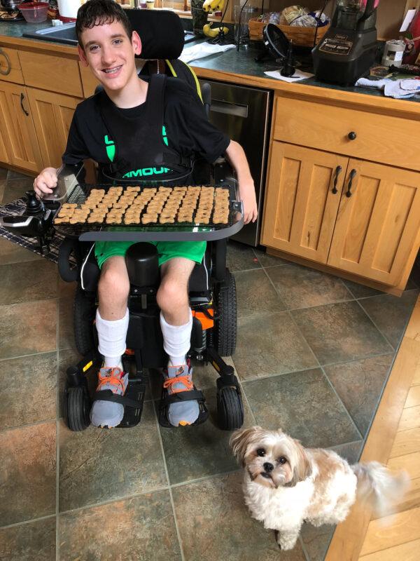 Nick Napolitano with a batch of dog treats and his pooch, Hemi, the inspiration for the business. (Courtesy of Jennifer Hinze)