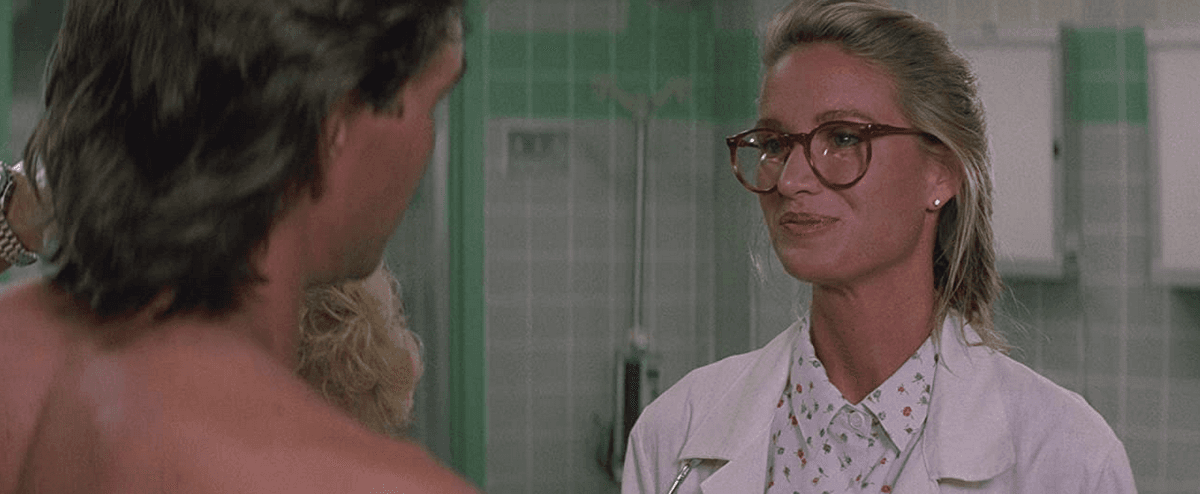 Dalton (Patrick Swayze) and Dr. Elizabeth Clay (Kelly Lynch) in the ER, in "Road House." (United Artists)