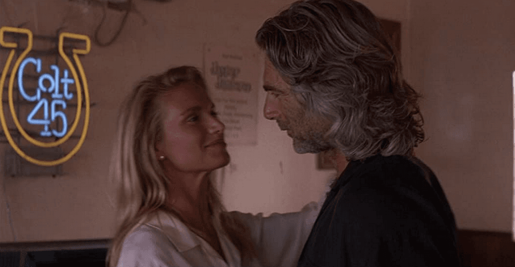 Dalton: "What are you doing?" Wade Garrett: "Stealin' yer woman." Wade Garrett (Sam Elliot) dances with the doctor (Kelly Lynch) in "Road House." (United Artists)