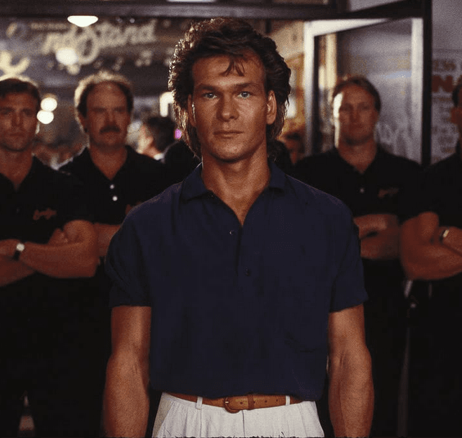 One of the best bouncers in the business, Dalton (Patrick Swayze) and his phalanx of bouncers at the Double Deuce, in "Road House." (United Artists)