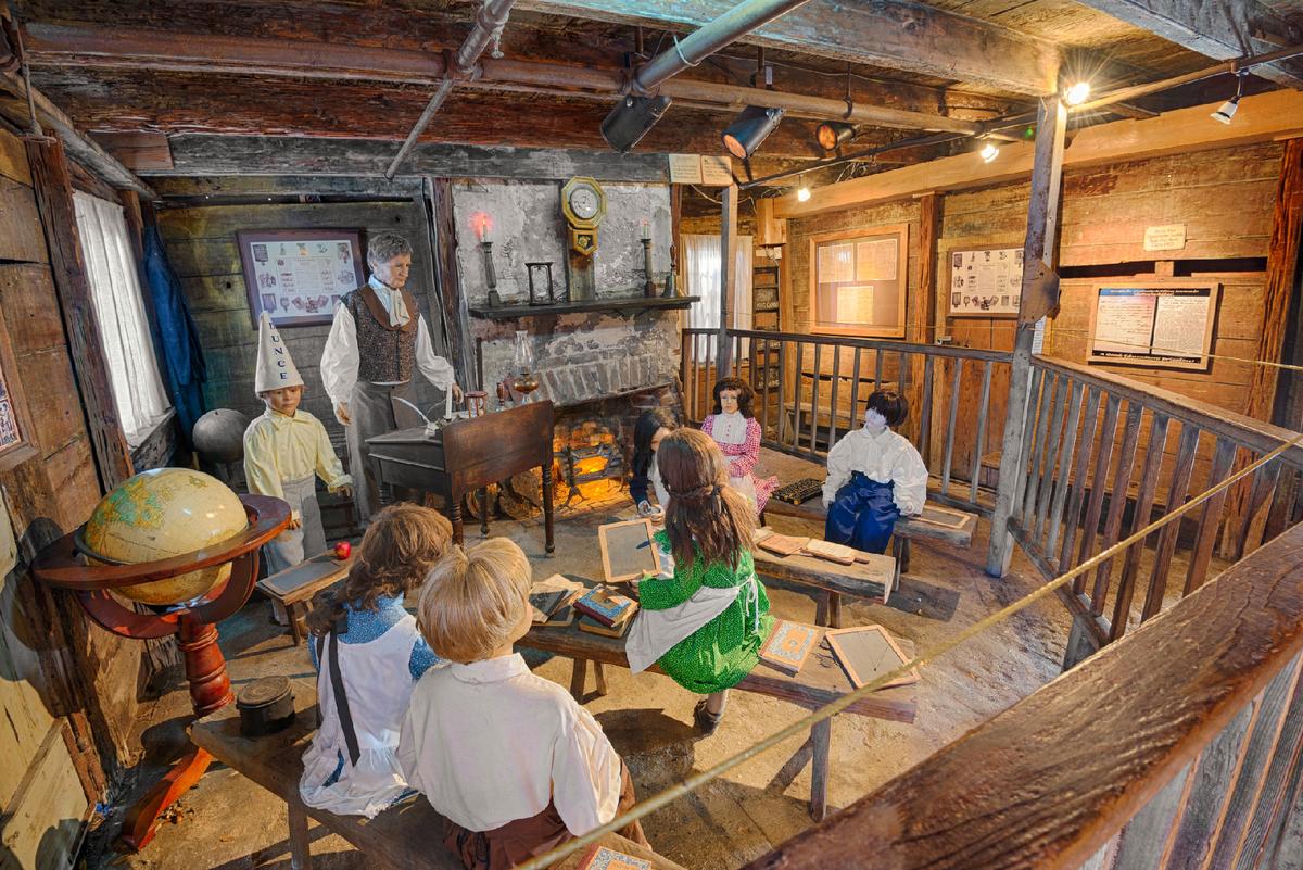 An animatronic teacher instructs his pupils at the Oldest Wooden Schoolhouse in St. Augustine, Florida. (Courtesy of Miroslav Liska/Dreamstime.com)