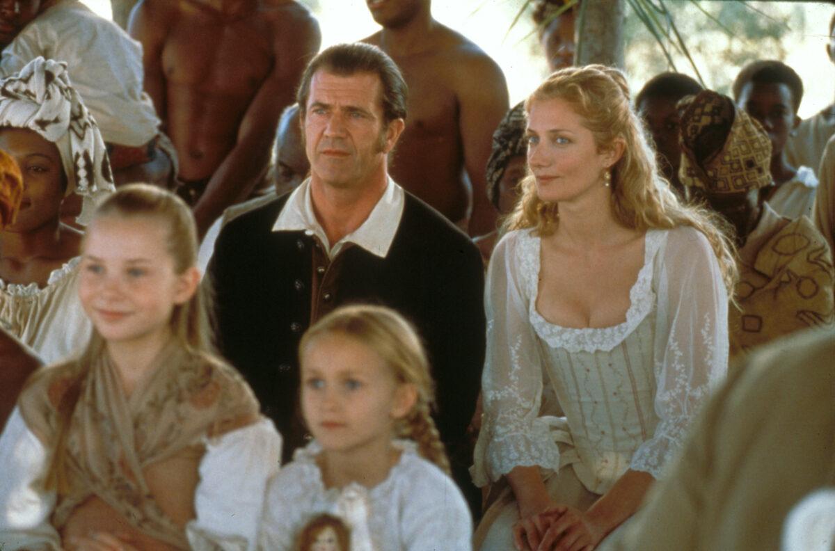 South Carolina colonist Benjamin Martin (Mel Gibson) sits with the children's Aunt Charlotte (Joely Richardson), in "The Patriot." (MovieStillsDB)