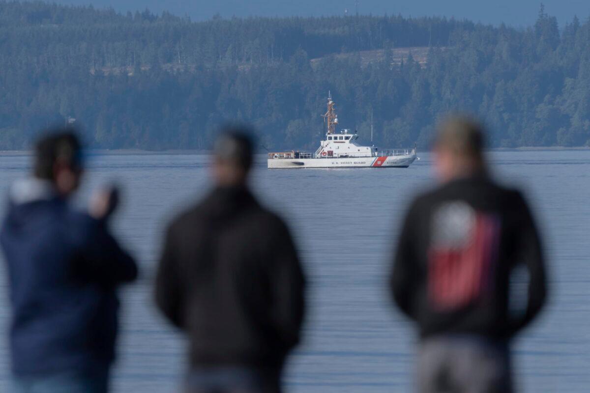  A U.S. Coast Guard vessel searches the area near Freeland, Wash., off Whidbey Island north of Seattle, on Sept. 5, 2022on Sept. 5, 2022. (Stephen Brashear/AP Photo)