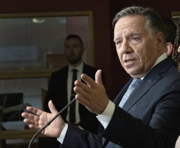 Coalition Avenir du Quebec Leader Francois Legault speaks to the media while campaigning In Longueuil, Que.,Sept. 19, 2022. (The Canadian Press/Ryan Remiorz)