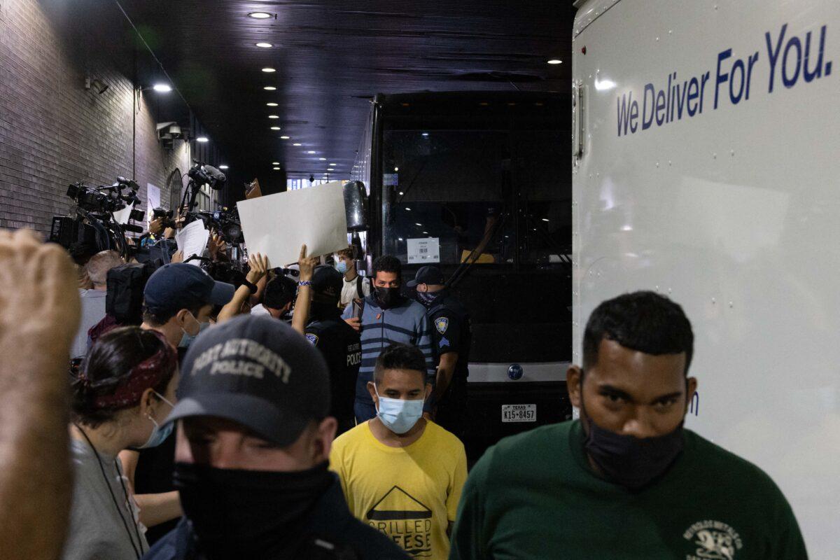A bus carrying illegal immigrants from Texas arrives at the Port Authority Bus Terminal in New York on Aug. 10, 2022. (Yuki Iwamura/AFP via Getty Images)