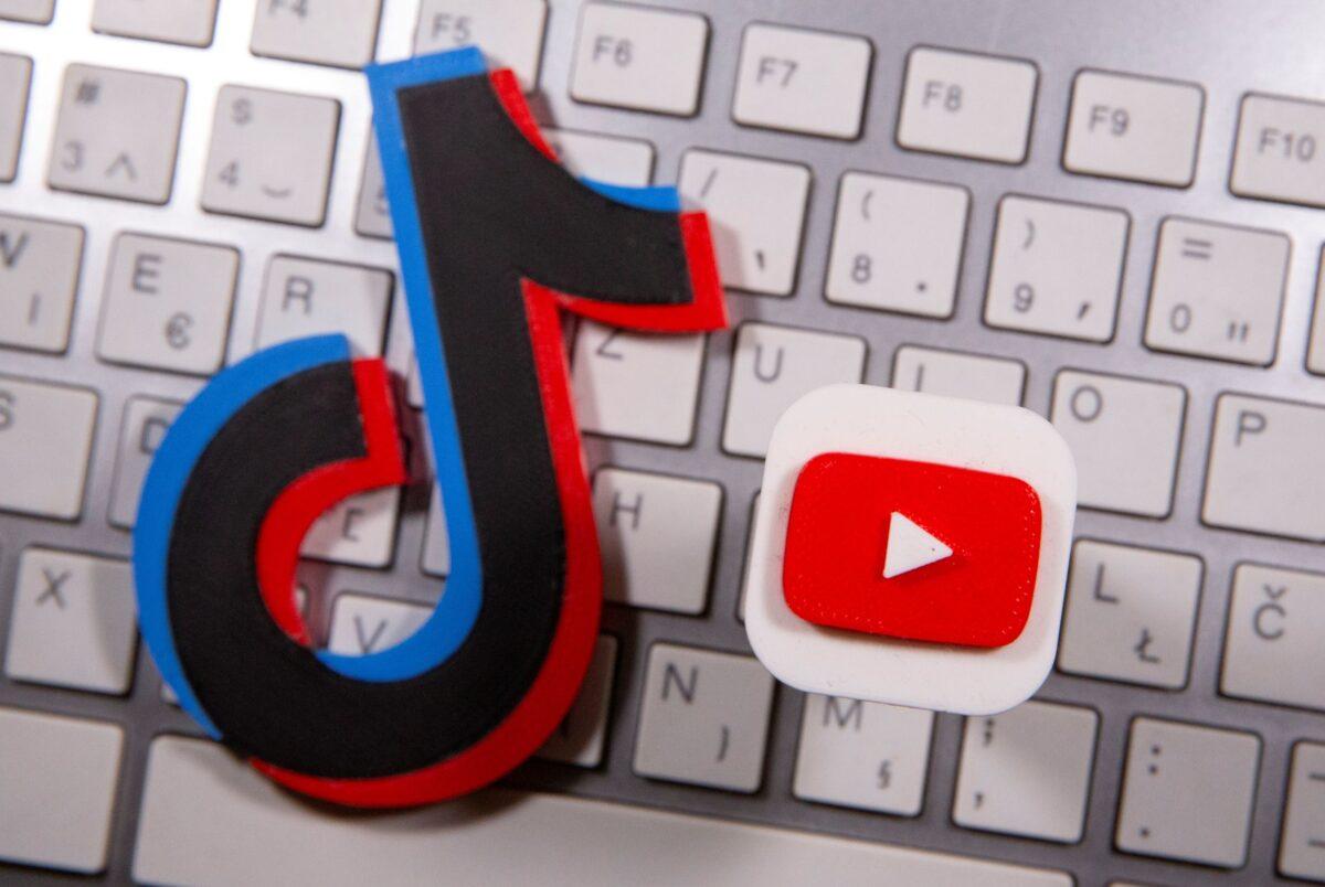 Some experts believe TikTok is used by the Chinese government to undermine American culture. Photo shows a 3D-printed Youtube and Tik Tok logo placed on keyboard on Sept. 15, 2020. (Dado Ruvic/Reuters)