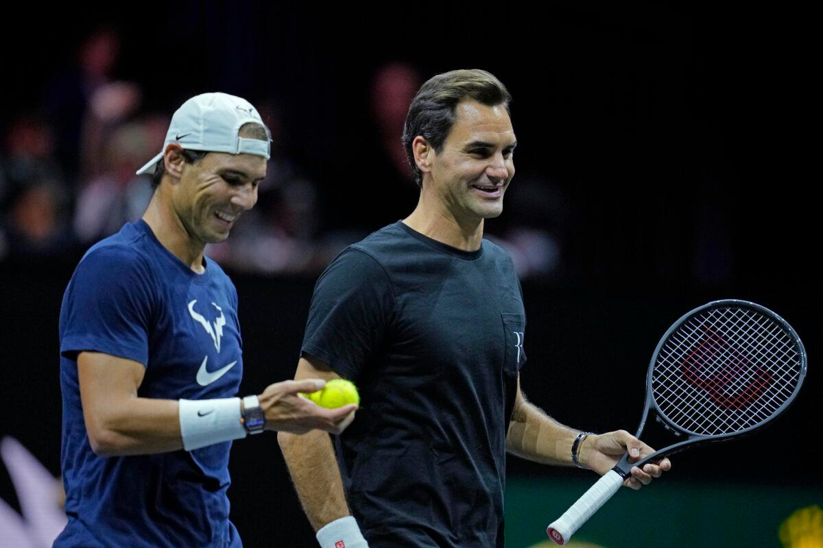 Switzerland's Roger Federer (R) and Spain's Rafael Nadal attend a training session ahead of the Laver Cup tennis tournament at the O2 in London on Sept. 22, 2022. (Kin Cheung/AP Photo)