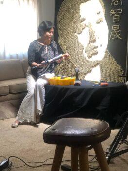 Chinese human rights lawyer Gao Zhisheng's wife Geng He working on the sculpture made of over 7,000 bullet shells in the summer of 2022. (Courtesy of Geng He)
