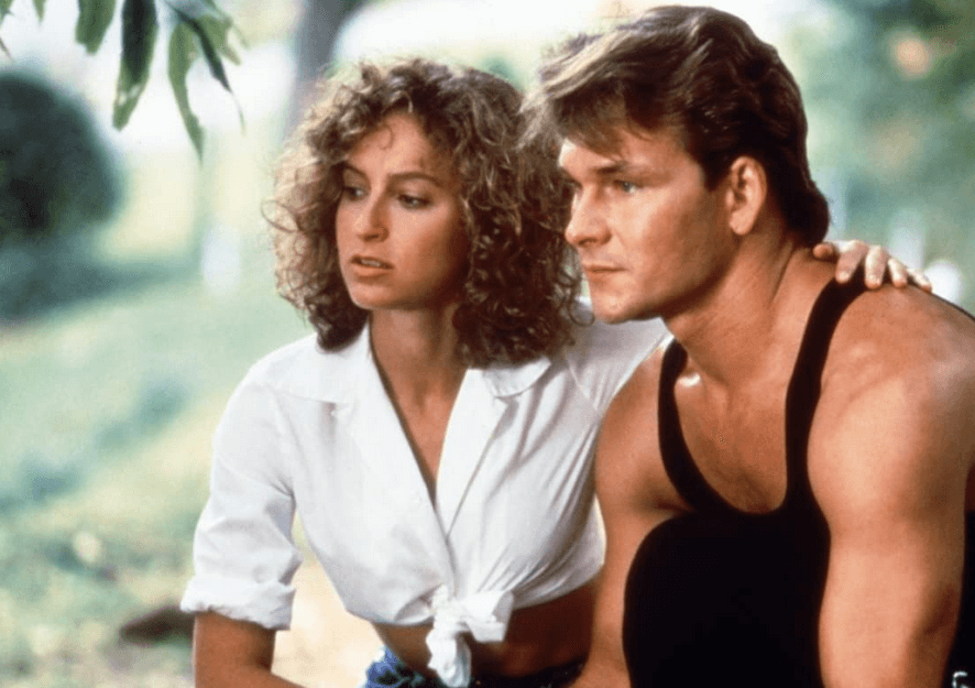 Baby Houseman (Jennifer Grey) and Johnny Castle (Patrick Swayze) contemplate the American Dream and society's economic classes, in "Dirty Dancing." (Artisan entertainment/Vestron Pictures)