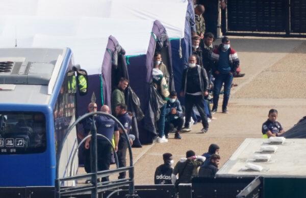 Groups of illegal immigrants are housed in tents after being brought in to Dover, Kent, from Border Force vessels following a number of small boat incidents in the English Channel, on Sept. 22, 2022. (Gareth Fuller/PA Media)