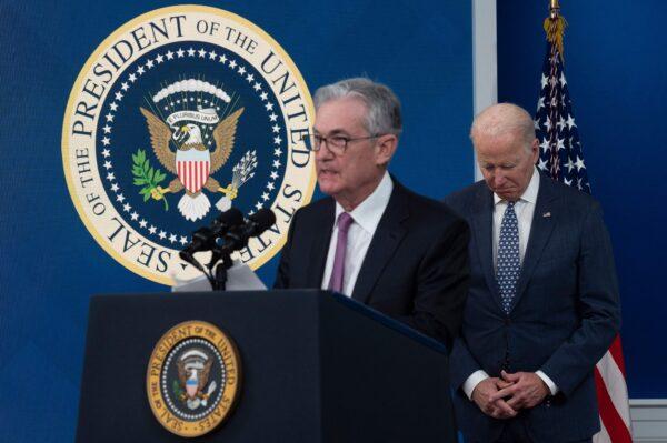Federal Reserve Chair Jerome Powell (L) speaks as President Joe Biden (R) listens during an announcement at the White House in Washington, D.C., on Nov. 22, 2021. (Jim Watson/AFP via Getty Images)