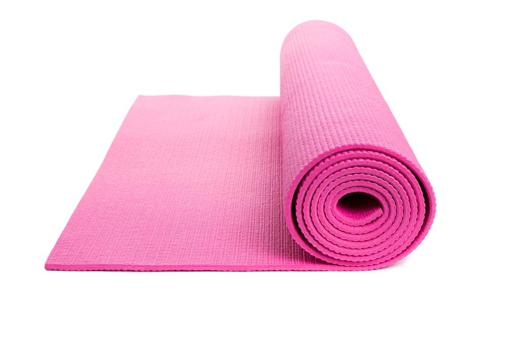 An exercise mat makes doing planks or other floor-based exercises more pleasant, but if you don’t have one, you can make do with a thick towel. (Feng Yu/Shutterstock)
