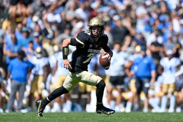 Quarterback Owen McCown (7) of the Colorado Buffaloes rolls out of the pocket in the second quarter of a game against the UCLA Bruins at Folsom Field in Boulder, Colo., on Sept. 24, 2022. (Dustin Bradford/Getty Images)