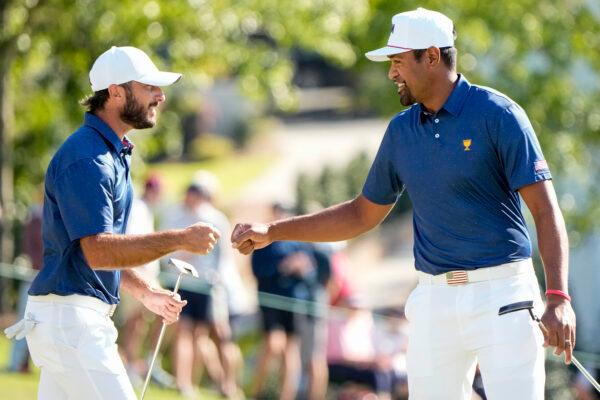 Max Homa and Tony Finau celebrate on the 12th hole during their foursomes match at the Presidents Cup golf tournament at the Quail Hollow Club in Charlotte, Sept. 24, 2022. (Chris Carlson/AP Photo)